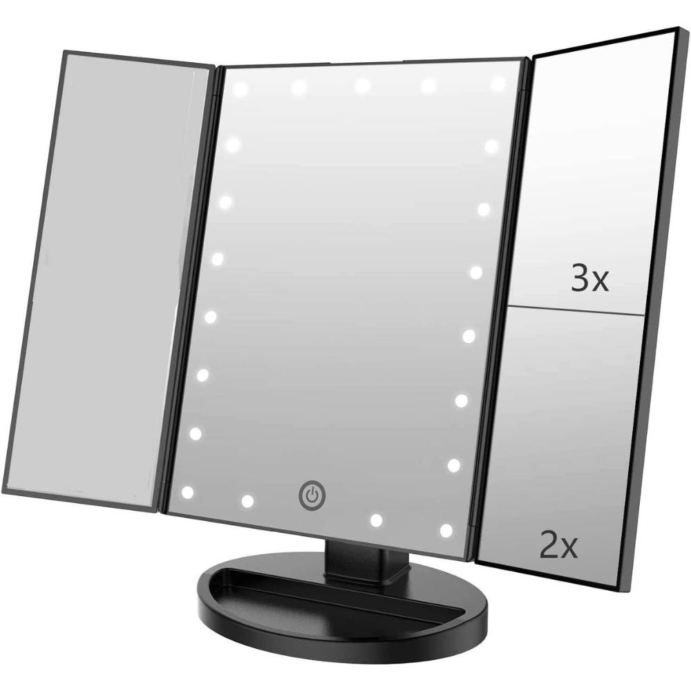 A lighted vanity makeup mirror switched on